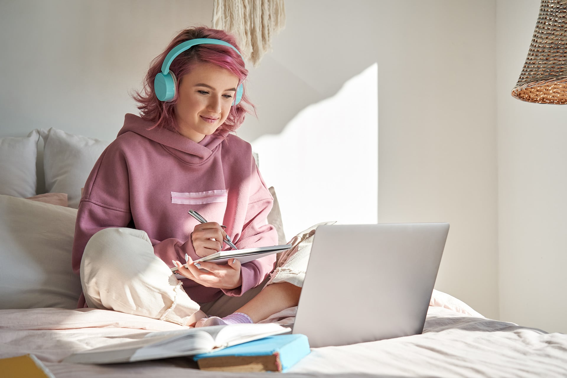 A teenager works on her homework